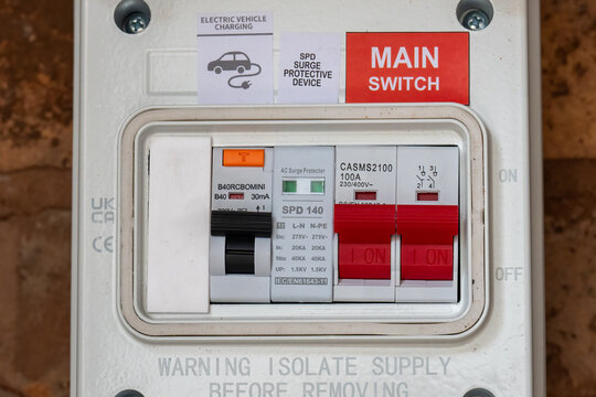 Residential EV Charging Circuit Breaker Box with Surge Protection on brick Wall