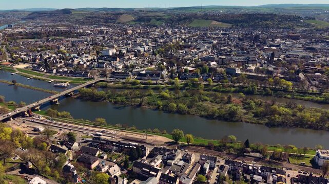 An aerial panorama view of the city Trier,  on a sunny early spring noon in Germany beside the river Mosel.