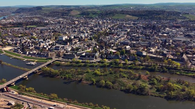 An aerial panorama view of the city Trier,  on a sunny early spring noon in Germany beside the river Mosel.
