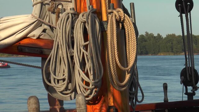 HELSINKI, FINLAND - August 6, 2013: Sailing schooner at the pier, rigging of the schooner.

Warm summer evening.