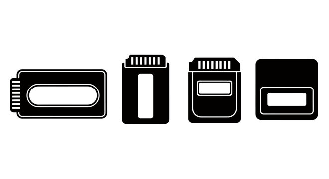 Set of four black USB flash drives displayed on white background with varied shapes.