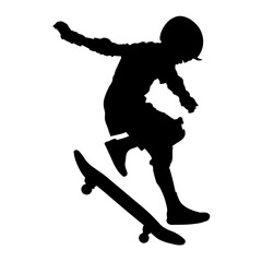 Fototapeta premium A silhouette of a child performing a trick on a skateboard.