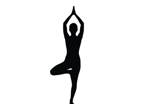 Person performing tree pose with arms raised in a balanced yoga stance