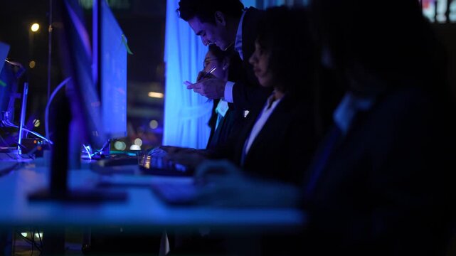 International multicultural experts with diverse ethnic team members scrutinizing advanced AI and neural network patterns at a high tech operations center at night.