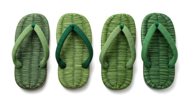 Traditional Japanese woven tatami sandals with green straps a pair of zori flip flops cultural footwear for summer festivals and casual wear