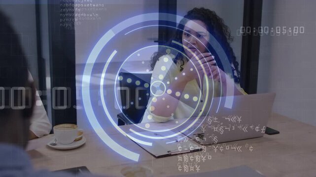 Peer speaking woman in yellow moving viewing PC noting HUD timecode rotating over table in business