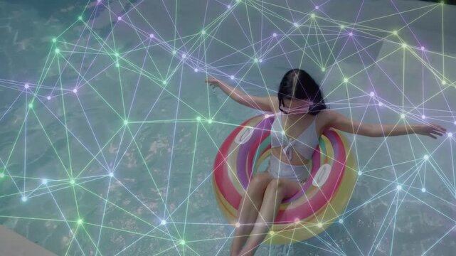 Woman balancing donut float shifting weight to rebalance causing ripples while tech overlay gliding