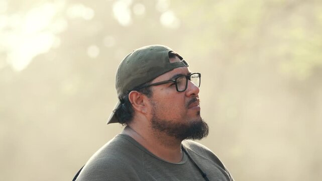 Contemplative man looking up at the sky