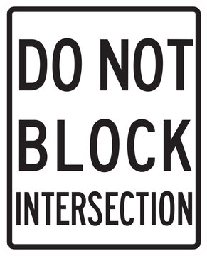 DO NOT BLOCK INTERSECTION, ROAD SIGN