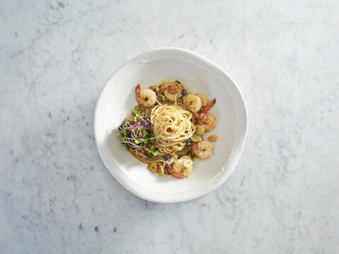 Shrimp garlic oil pasta on a plate