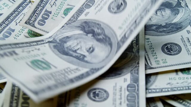 Discover the allure of cash as it glimmers and shines, creating a buzz of energy and excitement in an inspiring atmosphere, capturing the essence of financial freedom
