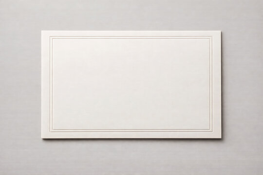 White rectangular frame with double lined border on light gray background