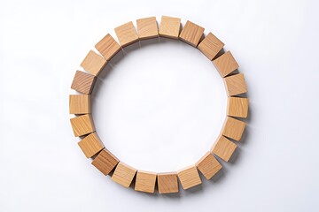 Naklejka premium Natural wooden beads bracelet forming an oval shape on a clean white background