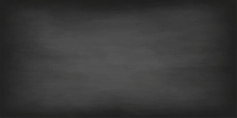 Vintage dark gray chalkboard background with a dirty grunge texture and blank old blackboard surface design for a weathered wall backdrop © QUALITY BOOST