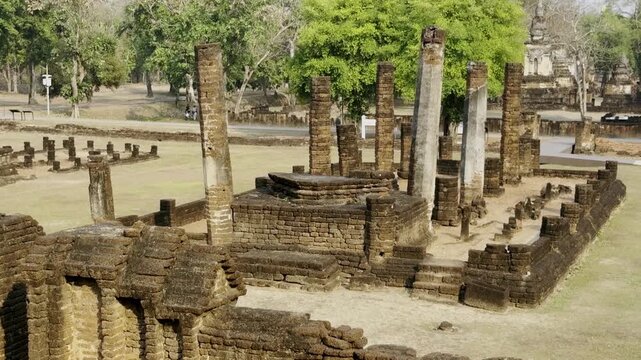 Close-up of ancient laterite stone wall and gateway ruins at Wat Chang Lom, Sukhothai.