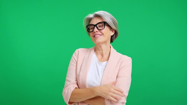 Senior businesswoman thinking and finding a solution on green screen