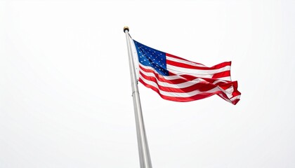 Fototapeta premium The American flag waves proudly, thirteen red and white stripes with blue field and white stars, symbolizing national identity, patriotism, and unity against a clear sky.