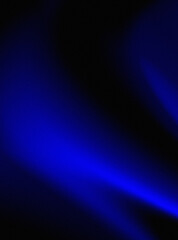 Obraz premium Vibrant blue light beam on a dark background with glowing effect