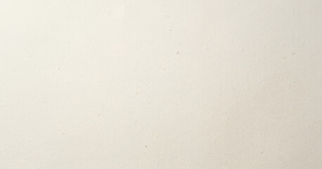 Naklejka premium A textured background featuring a soft, neutral color that creates a calm and minimalistic atmosphere, suitable for various design projects.