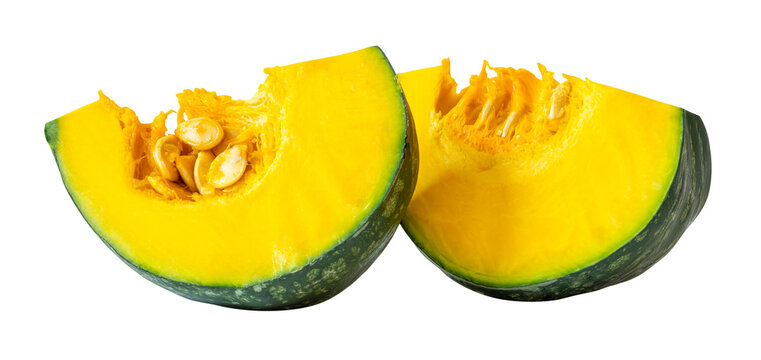 Green Japanese pumpkin fruit cut into two pieces or quarters or slices in stack isolated with clipping path in png file format