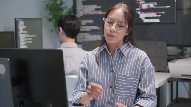 Programmer software engineer application server database developer coding working computer laptop indoor office, business information technology concept