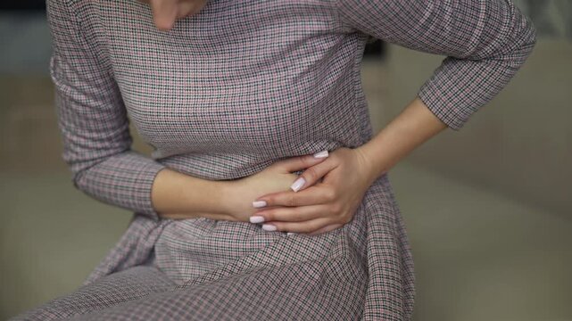 Patient Holding Suffering From Stomach Pain. Gastritis Or Appendicitis Illness Symptom. Healthcare Problems