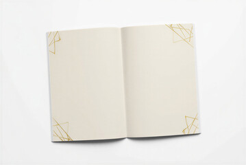 Fototapeta premium Elegant Open Notebook with Geometric Gold Embellishments on White Background