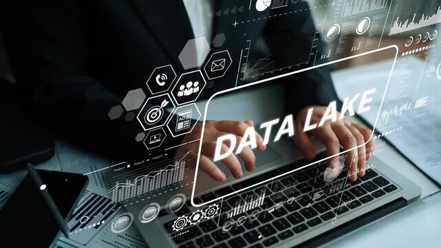 Person Working with Laptop on Data Lake Concept with Digital Graphs and Icons in Modern Office Environment. Asymptotic smart data analytic.