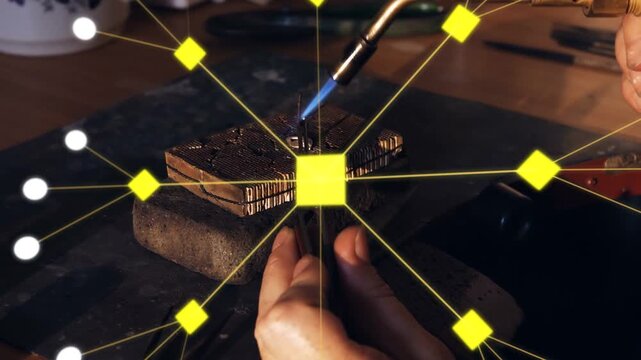Torch contacting metal, artisan heating wire, yellow network expanding over hands showing soldering