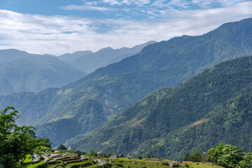 Naklejka premium Above the Valley – Misty Mountains of Vietnam