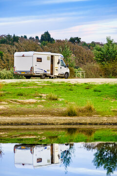 Camper rv camping at lake shore. Alentejo Portugal.