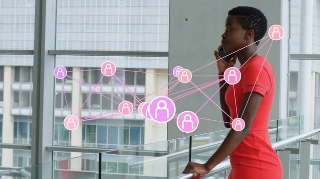 Woman on phone walking railing upon network nodes appearing, crossing torso and showing tech links