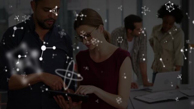Man pointing tablet, woman tapping screen, starting office review, atomic icons passing over people