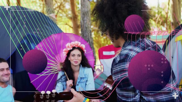 Guitarist strumming music at campsite causing purple spheres around pink parasol for friends' fun