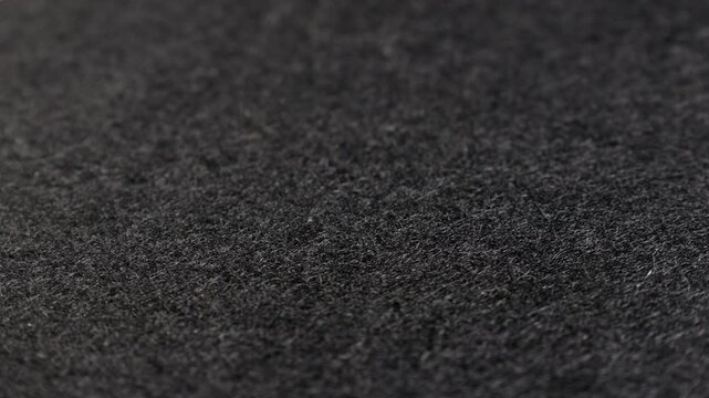 Gray graphite background. Side view. 4k video