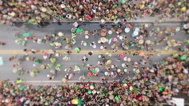 Aerial view of the street block carnival named Samambloco on the street of the town of Campeche, Florianopolis, Brazil