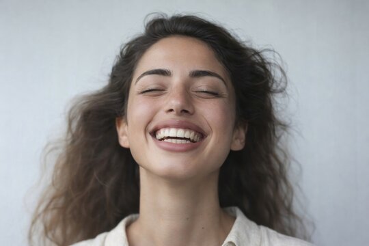 Joyful woman with radiant smile.