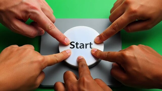 Many hands pressing start button together.