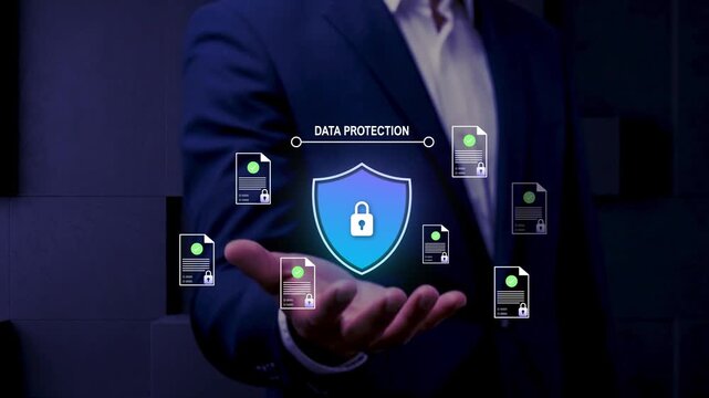 Cybersecurity and Data Protection Concept with Businessman Holding Shield Icon, Privacy Compliance, GDPR and Secure Information Management