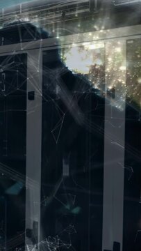 Vertical video: Sliding doors showing green-gold cloud emerging lower left, forming beams for tech