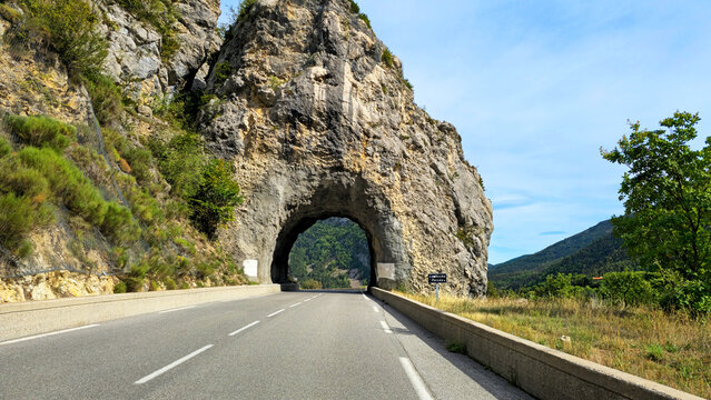 La Roche Percee rock tunnel on N202 road, French Alps, Alpes-de-Haute-Provence, France, Europe.
