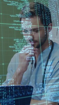 Vertical video: Doctor examining tablet, analyzing patient data with stethoscope, HUD overlaying