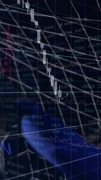 Hooded man with headset sliding behind mesh, market data updating, candles reversing showing gains