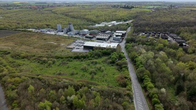 Aerial drone view of a massive brick and concrete manufacturing plant in Swadlincote UK