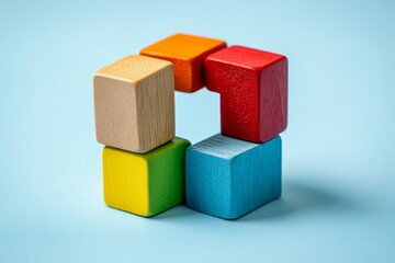 Obraz premium Colorful Wooden Blocks Forming a Shape - Creative Puzzle Concept