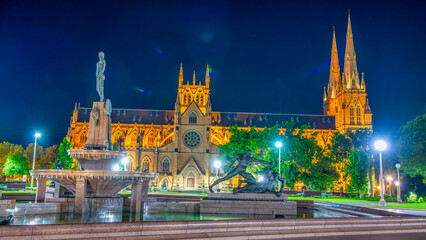 Naklejka premium St Mary Cathedral at night in Sydney