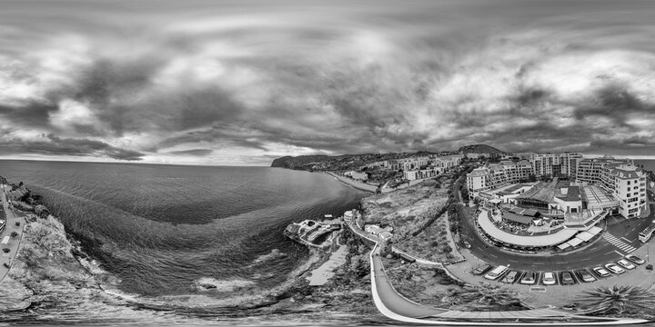 Panoramic 360 degrees perspective of Madeira&rsquo;s Doca do Cavacas with yachts, harbor infrastructure, and turquoise waters blending with the urban waterfront