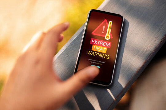 Extreme heat warning, climate change impact, heatwave alert on Mobile phone