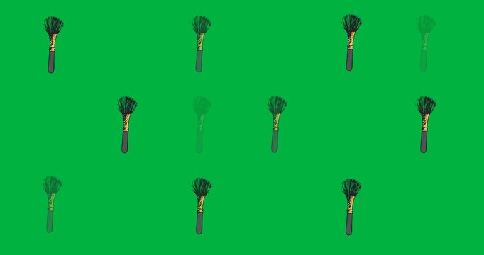 Digital animation of multiple makeup brush icons against black background
