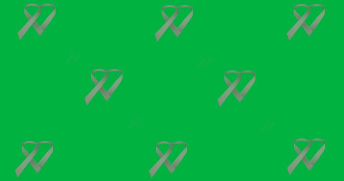 Digital animation of multiple pink ribbon heart icons against black background